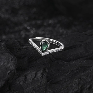 Elegant V-shaped S925 silver ring featuring a pear-cut emerald zircon and paved diamonds