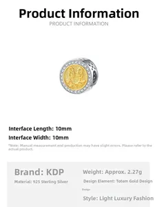 Macro detail of S925 silver pendant featuring gold-toned totem relief and diamond accents