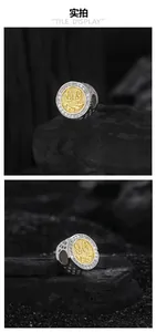 Detail of s925 silver bead charm with gold relief pattern and cubic zirconia stones