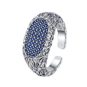 Vintage S925 sterling silver open ring with blue zircons and engraved scroll texture