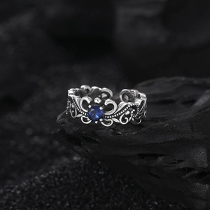 Vintage S925 sterling silver ring with blue zircon and intricate filigree textures