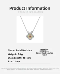 Détail du pendentif pétale en argent S925 avec placage d'or et pierre centrale rouge