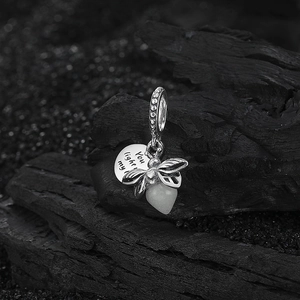 S925 silver bee heart pendant with You light my engraving on a dark textured background