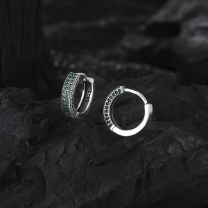 Vintage S925 sterling silver hoop earrings featuring green cubic zirconia stones
