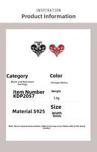 Detail view of S925 silver heart studs with vintage vine texture and red-black enamel