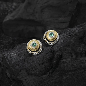 Two-tone S925 silver crescent stud earrings with green gemstone and brushed gold finish