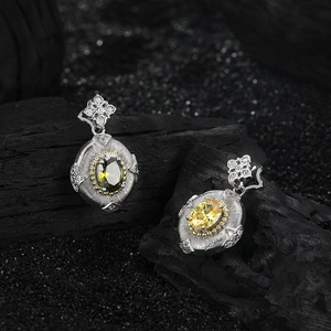 Vintage S925 sterling silver four-leaf flower earrings with green and yellow gemstones