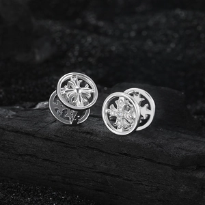 Gothic S925 silver cross earrings with zircon inlays on a dark textured background