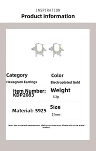 Detail view of S925 sterling silver hexagram earrings with gold accents and carved texture