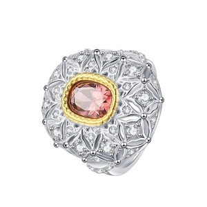 Vintage S925 silver ring with oval pink gemstone and intricate gold filigree design