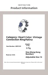 Close-up of S925 silver connected heart ring with blue zircon inlay and vintage finish