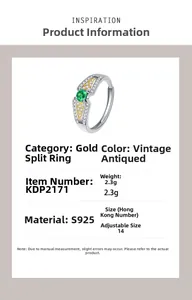 Detailed specs of S925 silver angel wing ring with green zircon and two-tone gold finish