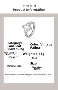 Detailed macro view of S925 sterling silver four-leaf clover ring with white shell inlay