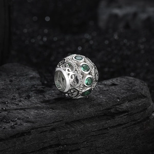 S925 sterling silver hollow charm with green zircon and retro vine patterns