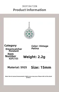Detailed view of S925 silver dreamcatcher pendant with green zircon and hollow design