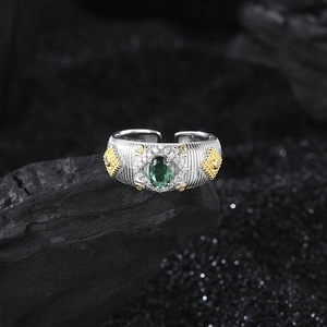 Vintage S925 silver adjustable ring with green emerald zircon and golden bead textures