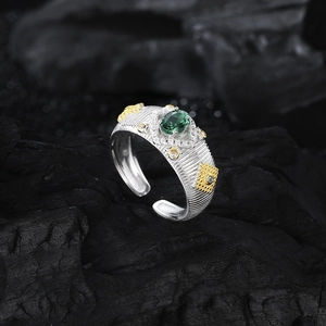 Adjustable S925 silver ring with green oval zircon and textured gold accents