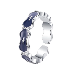 S925 sterling silver ring with blue enamel and star patterns on white background