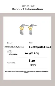 Detail view of bicolor butterfly earrings in S925 silver with specs 13mm and 2.3g