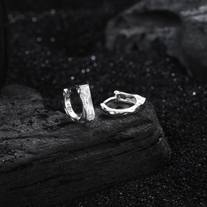 S925 sterling silver hoop earrings featuring a unique textured industrial lava design