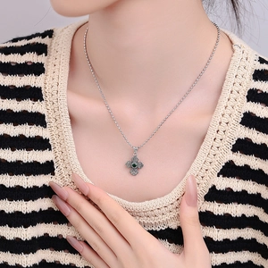 Vintage S925 sterling silver cross pendant necklace with green gemstone on beaded chain
