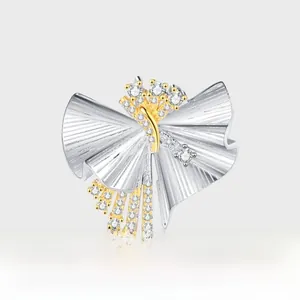 Detailed macro view of S925 silver fan-shaped pendant with gold fringe and zircons