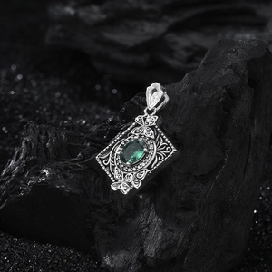 Vintage s925 silver butterfly book pendant with green zircon on black stone