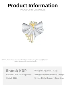 Macro view of S925 silver skirt pendant with gold plating and brushed metal texture