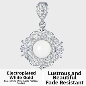Macro shot of s925 silver vintage palace pendant with white agate and pavé diamonds