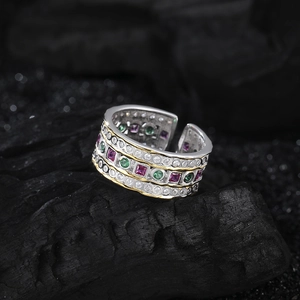 Three-layer S925 silver wide ring with colorful zircons on black charcoal background