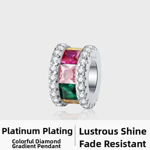 Macro shot of S925 sterling silver charm with colorful square zircon and micro-pave crystals