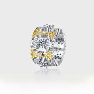 Detail of s925 vintage hollow lace pendant with two-tone gold plating and diamonds