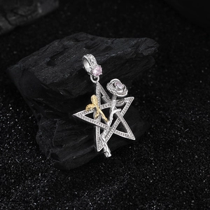 S925 silver star rose pendant with pink diamonds and gold accents on dark stone
