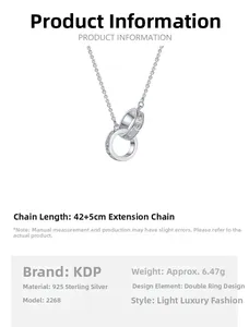 Detail of S925 sterling silver interlocking rings necklace with engraved scroll pattern