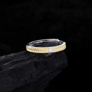 Elegant two-tone 925 silver ring with woven gold pattern and round crystal inlay