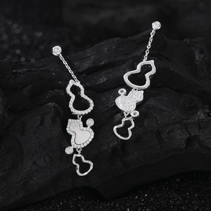 S925 silver long wulu tassel earrings featuring white shell and pavé set cubic zirconia