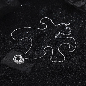 Elegant S925 sterling silver interlocking double ring necklace with relief vine patterns