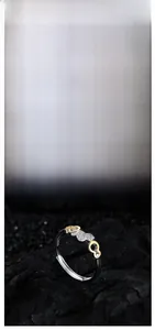 Macro detail of S925 sterling silver ring showing hulu shape and zircon inlay craftsmanship
