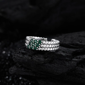 Adjustable S925 silver ring with triple row beaded band and nine green emerald-cut stones