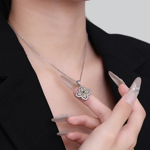 S925 silver hollow clover necklace with green gemstone and sparkling zircons for women