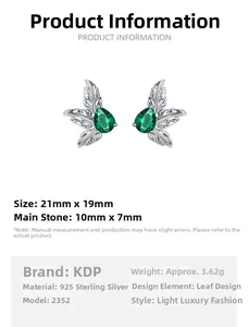 Detail of S925 sterling silver leaf earrings with 10x7mm green teardrop zircon accents
