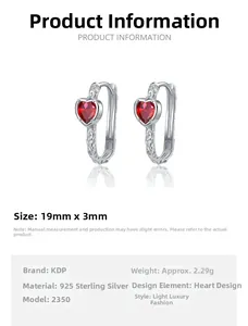 Detail of S925 sterling silver heart earrings with red zircon and textured engravings