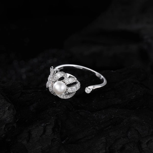 Elegant S925 sterling silver open ring featuring a white pearl and zircon accents