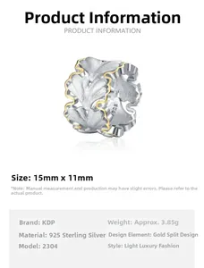 Macro shot of S925 sterling silver ginkgo leaf ring with brushed gold edge details