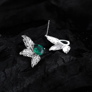 Elegant S925 sterling silver leaf earrings with pear-cut green zircon on dark charcoal