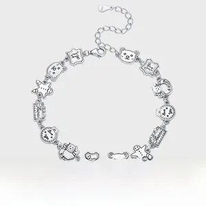 Détails des breloques ours et bonhomme de pain d'épices en argent S925 du bracelet