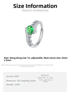 Detail showing an oval green zircon set in S925 silver with small side diamonds