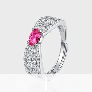 Macro view of S925 silver ring detailing garnet stone and hollow leaf patterns