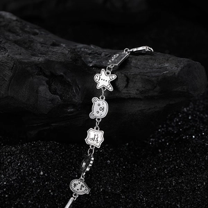 Bracelet vintage en argent S925 avec breloques ours et bonhomme de pain d'épices