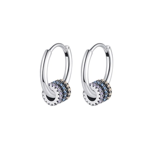 Macro detail of S925 silver hoop earrings with pavé set colorful zircon beads